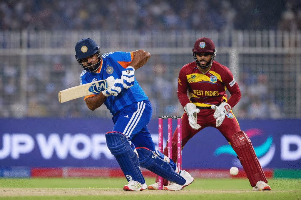 Indian batsman playing a front-foot shot against West Indies during T20 World Cup 2026 match at Eden Gardens, with wicketkeeper positioned behind the stumps.